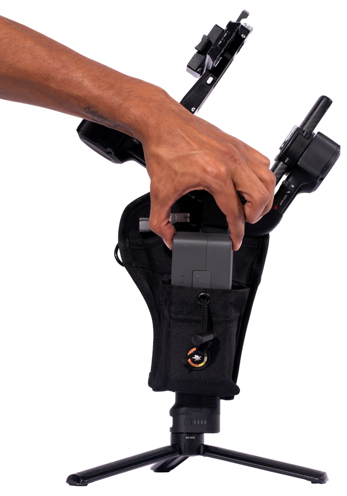 Hand drawing the gimbal up through the holster's wide bottom opening